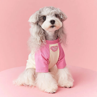 Red cotton dog summer clothes with contrast embroidery, laid flat showing size label.