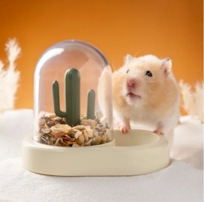 Cactus-shaped automatic hamster feeder with transparent food compartment in mint green colour