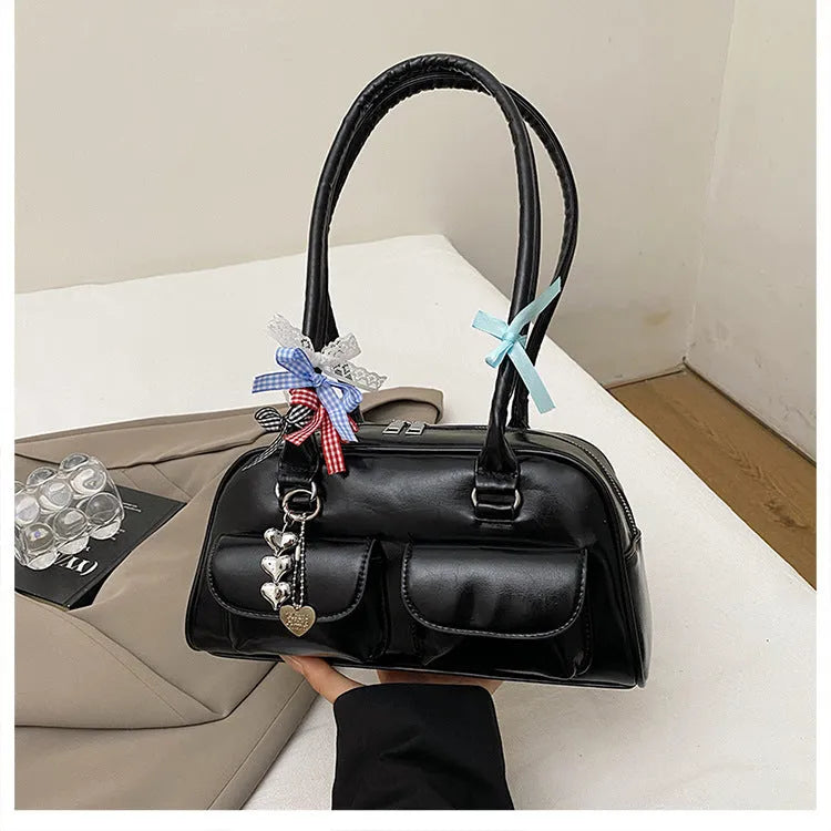 Women's retro pillow-shaped handbag in PU leather with double shoulder straps and flap closure