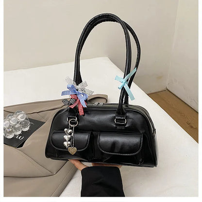 Women's retro pillow-shaped handbag in PU leather with double shoulder straps and flap closure