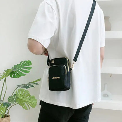 Nylon small crossbody shoulder bag with 3-layer zipper, card slot, square vertical shape, letter pattern, in red, dark blue, black or dark purple.