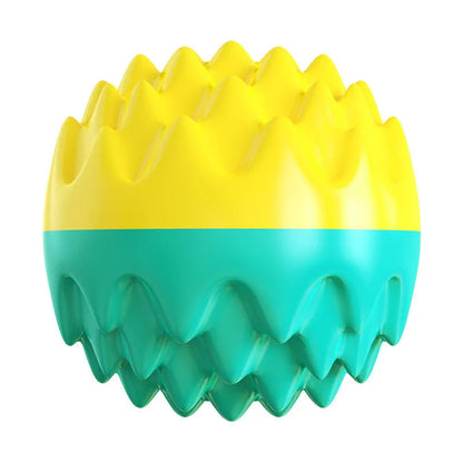 Blue and orange spiky rubber dog ball with squeaker for teeth cleaning and water fetch.