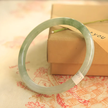 Green jade geometric bracelet with 10mm beads showing traditional Chinese style and adjustable sizing options