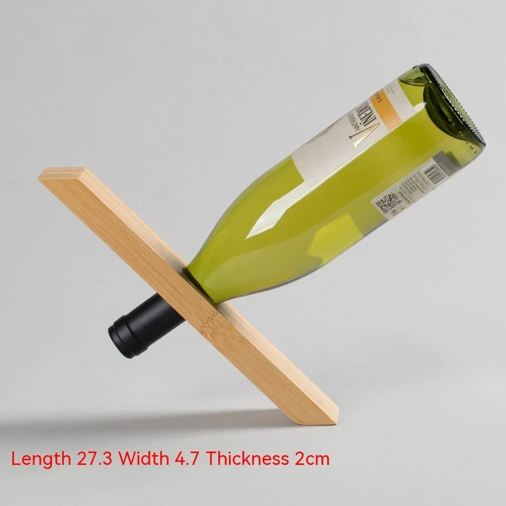 Natural bamboo wine bottle rack holding six bottles with wood grain visible