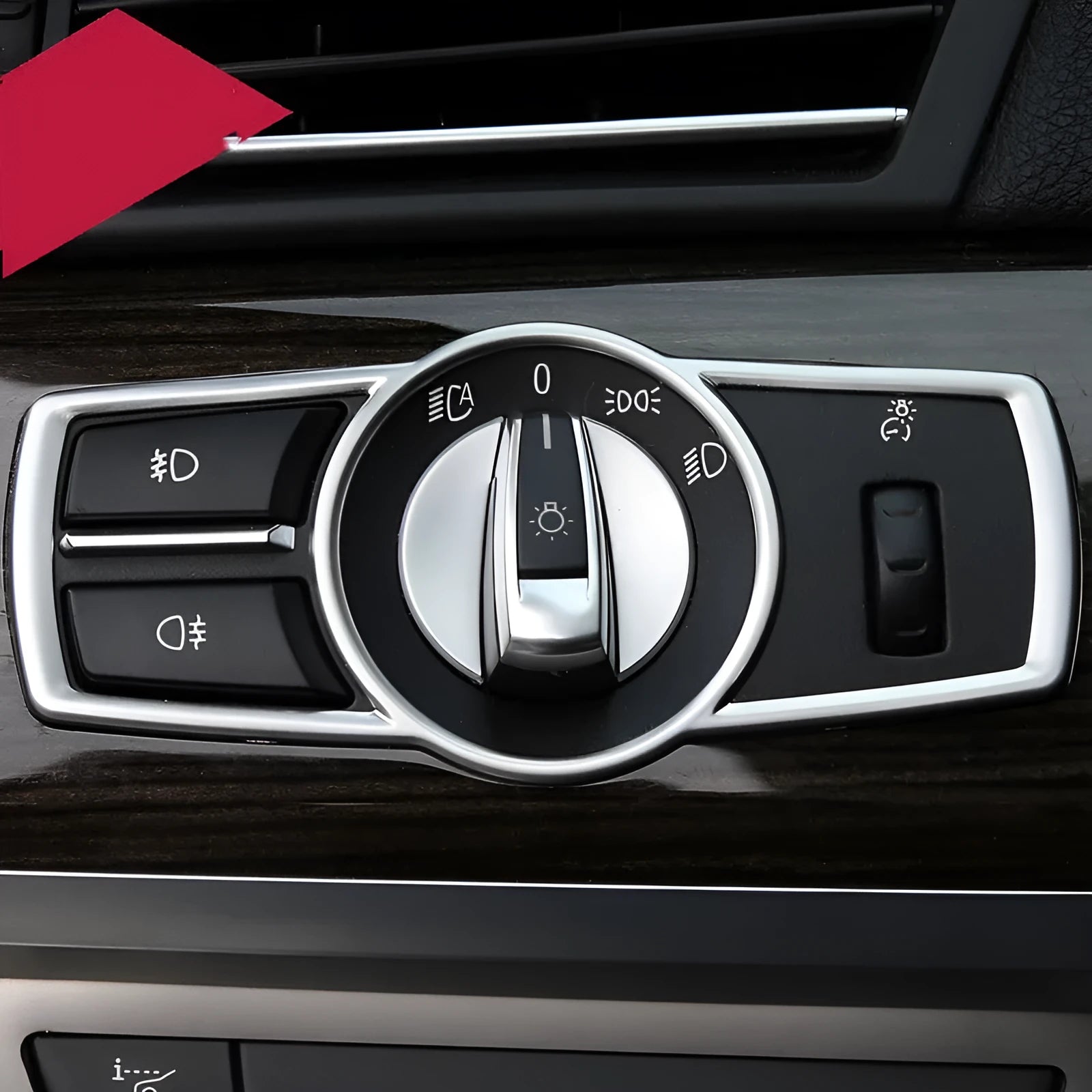 Silver ABS plastic decorative sticker for BMW headlight switch frame on dashboard.
