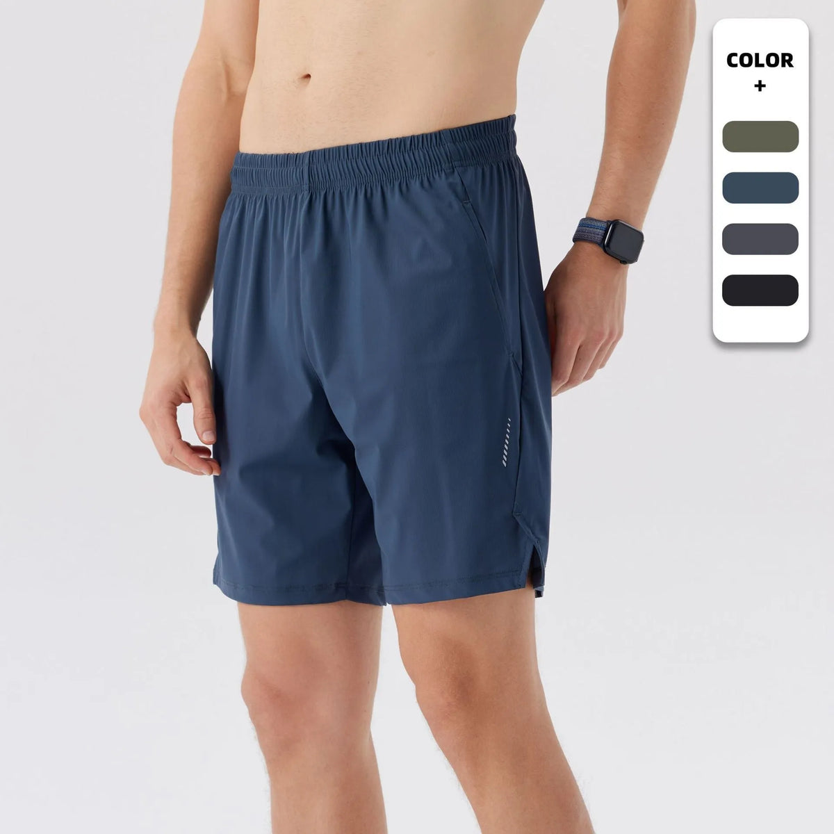 Men's black nylon sports shorts with mid-waist, shown flat.