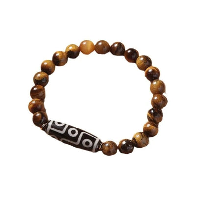 Tigereye dzi bead buddha bracelet with adjustable closure, shown in simple bracelet style.