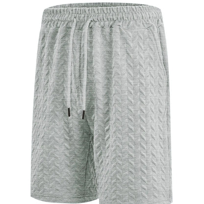 Men's loose jacquard drawstring casual beach pants in polyester, shorts length, available in seven colours and sizes S to 3XL