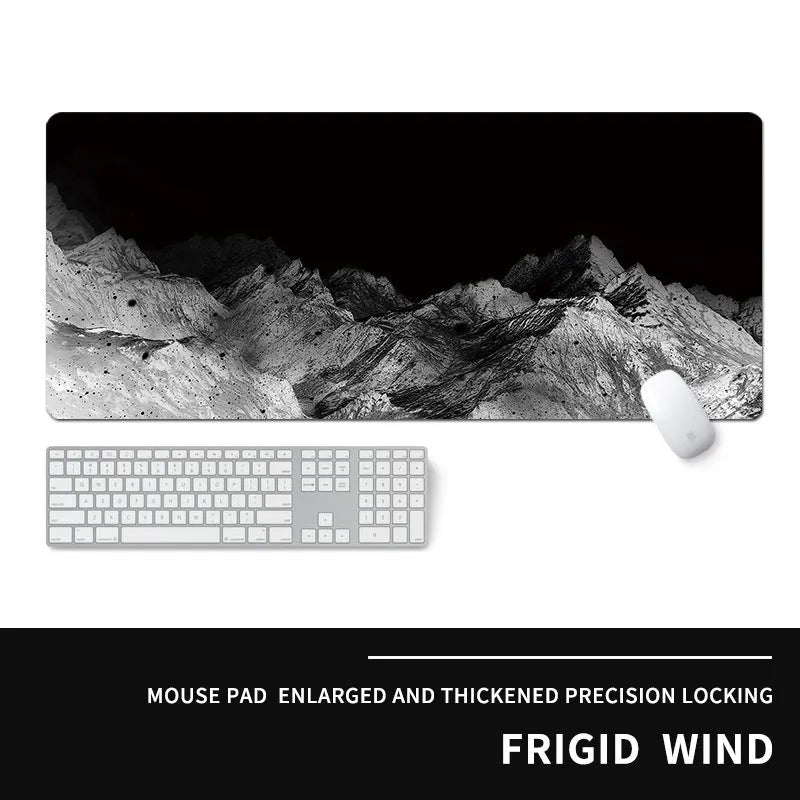 Oversized rectangular mouse pad with a printed design on a desk, next to a keyboard and mouse.