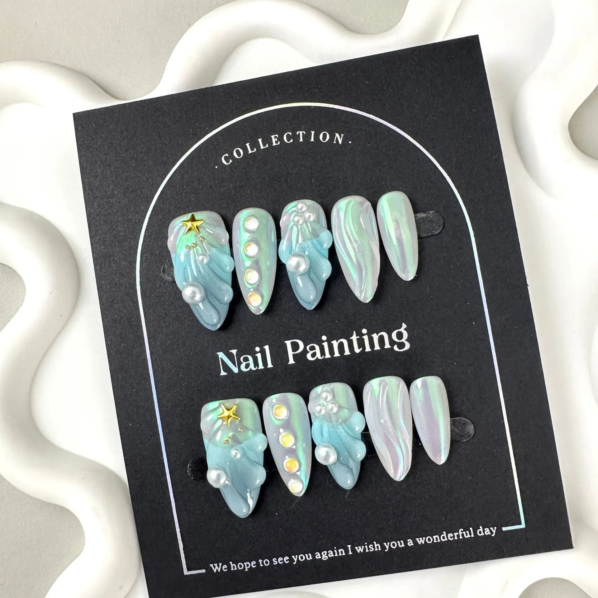 Blue shell design plastic nail tips in sizes XS, S, M, L from Hailang.