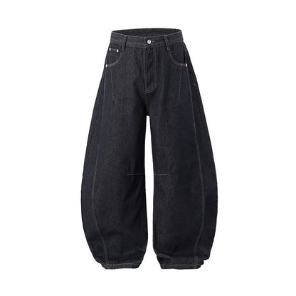 Men's wide leg denim trousers in original cow colour showing mid-waist design and relaxed fit