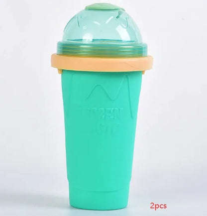 Smoothie cup in mint green or light pink with lid, straw spoon, and 201-300ml capacity for quick slush making