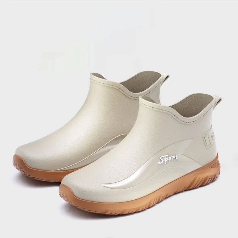 Men's short PVC rubber boots in beige, black, and black-red colours with a non-slip flat sole.