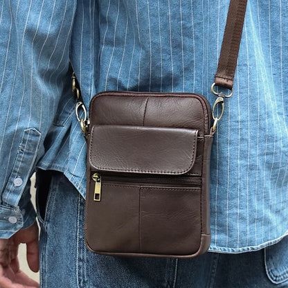 Men's brown genuine leather crossbody shoulder bag with visible stitching.