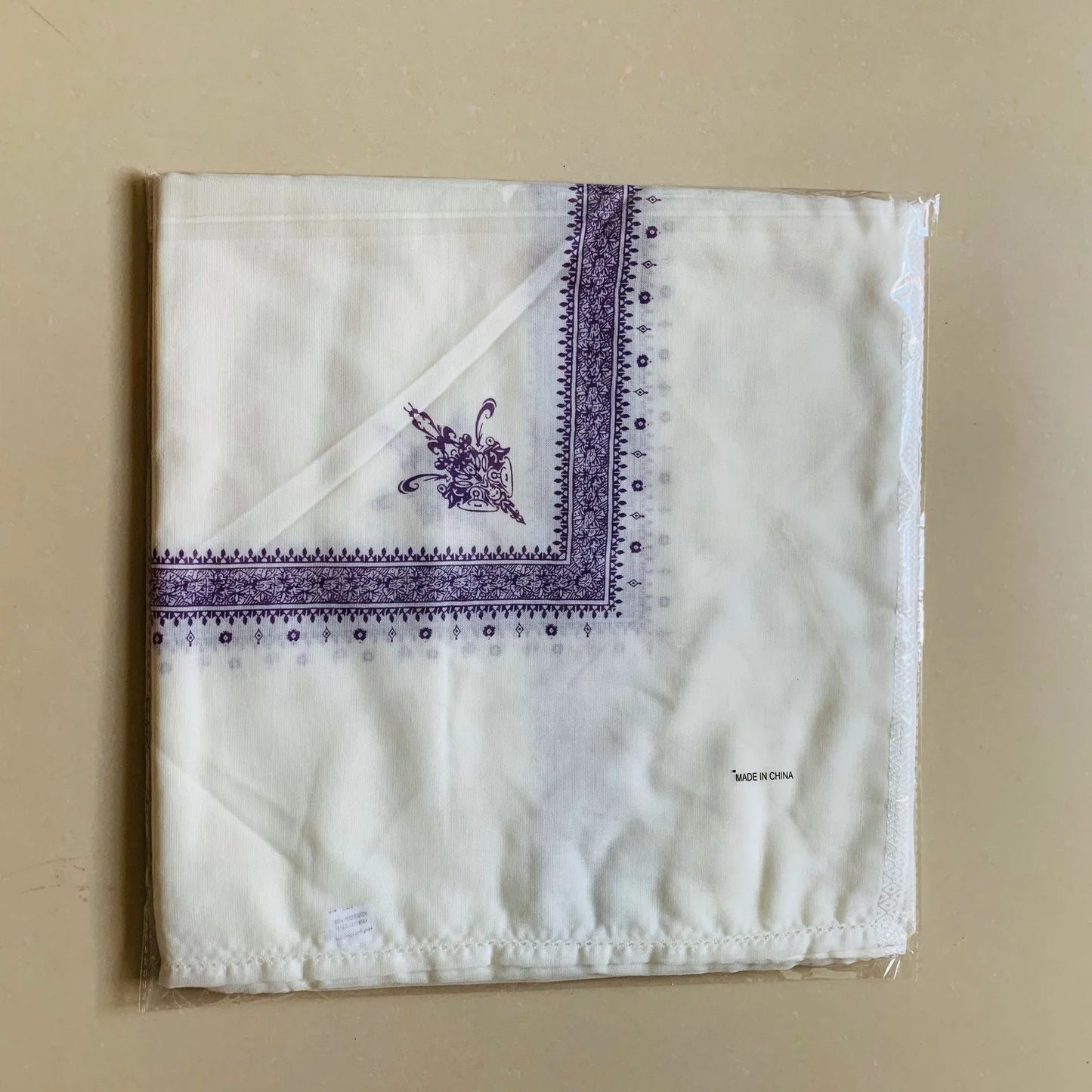 Printed square polyester scarf showing 138 cm dimensions with colour options including brown, grey, green, purple, magenta and dark blue