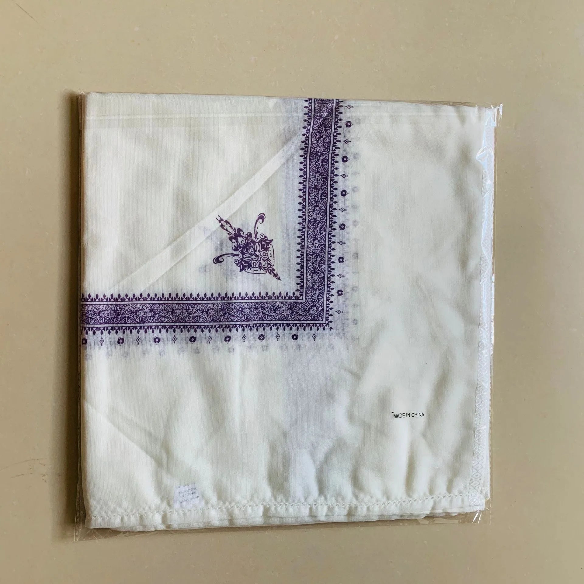 Printed square polyester scarf showing 138 cm dimensions with colour options including brown, grey, green, purple, magenta and dark blue