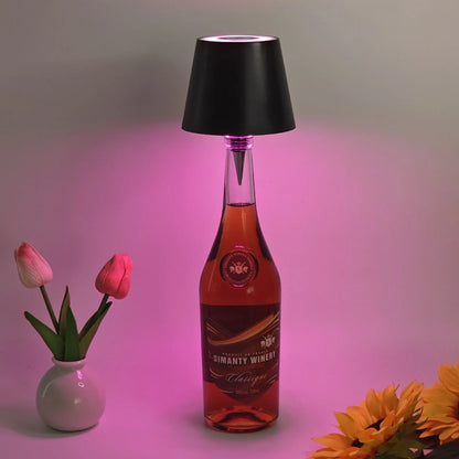 Wireless LED desk lamp in black tricolour finish, bottle-shaped with detachable base and touch control for 2000mAh powered lighting