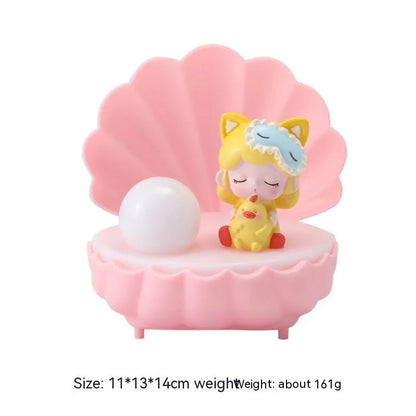 Shell-shaped resin night light with cartoon character design in choice of four colours
