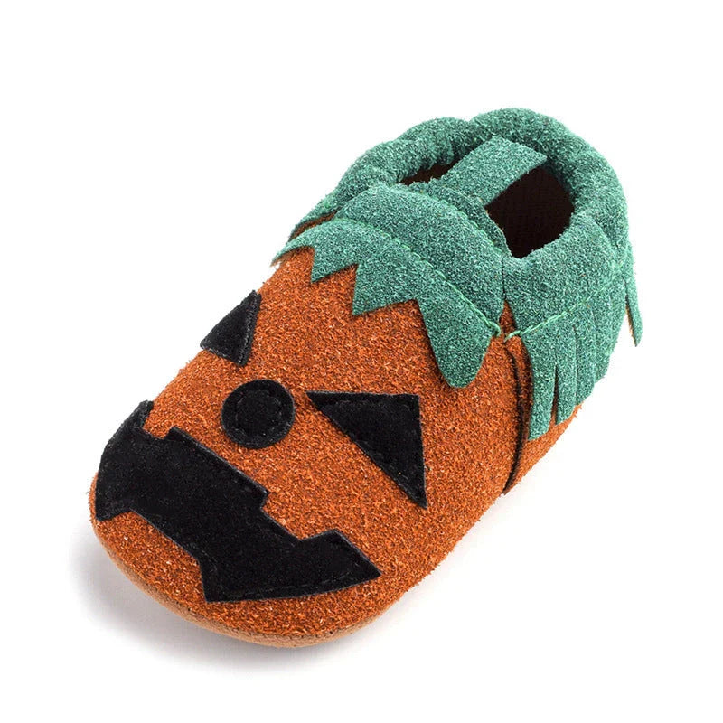Pumpkin-themed costume shoes for toddlers and young children in various sizes and colours