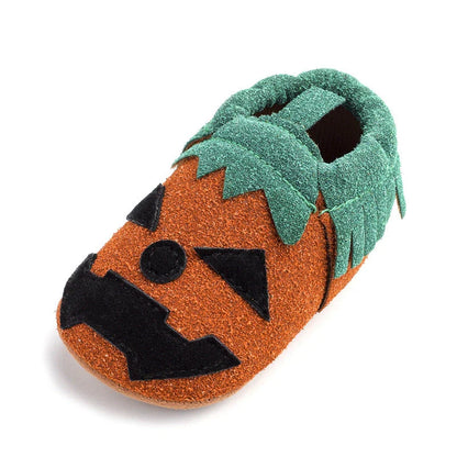Pumpkin-themed costume shoes for toddlers and young children in various sizes and colours