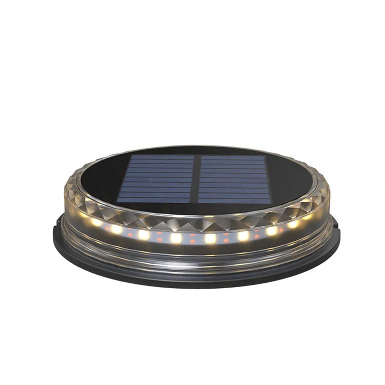 Square solar buried light with solar panel, 121mm dimensions, installed flush with ground surface