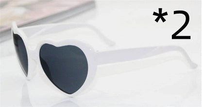 Fashionable heart-shaped light-up glasses with a built-in LED lighting system, perfect for adding a touch of love and playfulness to any occasion.