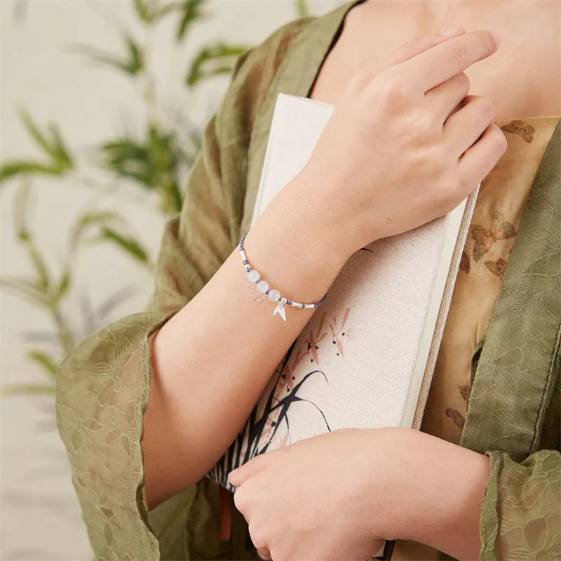 Hetian jade chalcedony bracelet with woven strap in diamond design with lotus detail