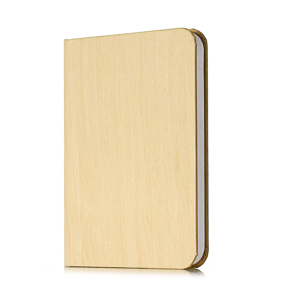 Modern wooden boy-shaped LED night light lamp on a surface in maple white, hu red, or hu black colour.