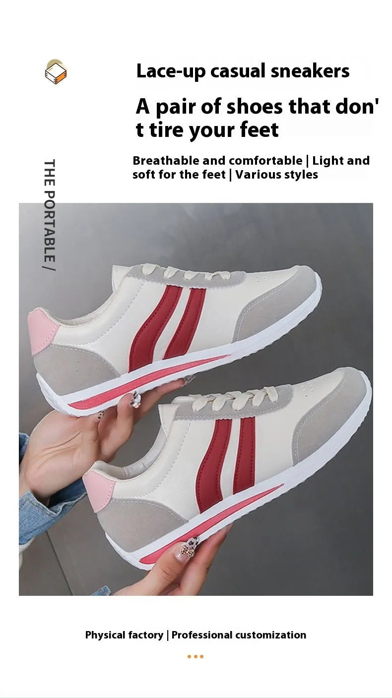 Blue and red low-top lace-up sneaker with soft rubber soles and mesh lining