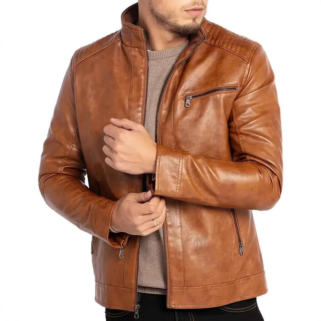 Men's brown artificial leather punk motorcycle jacket with a stand collar and straight hem on a grey background.