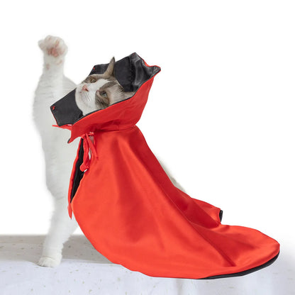 Red polyester Halloween cloak costume for a pet with an elastic neck closure.