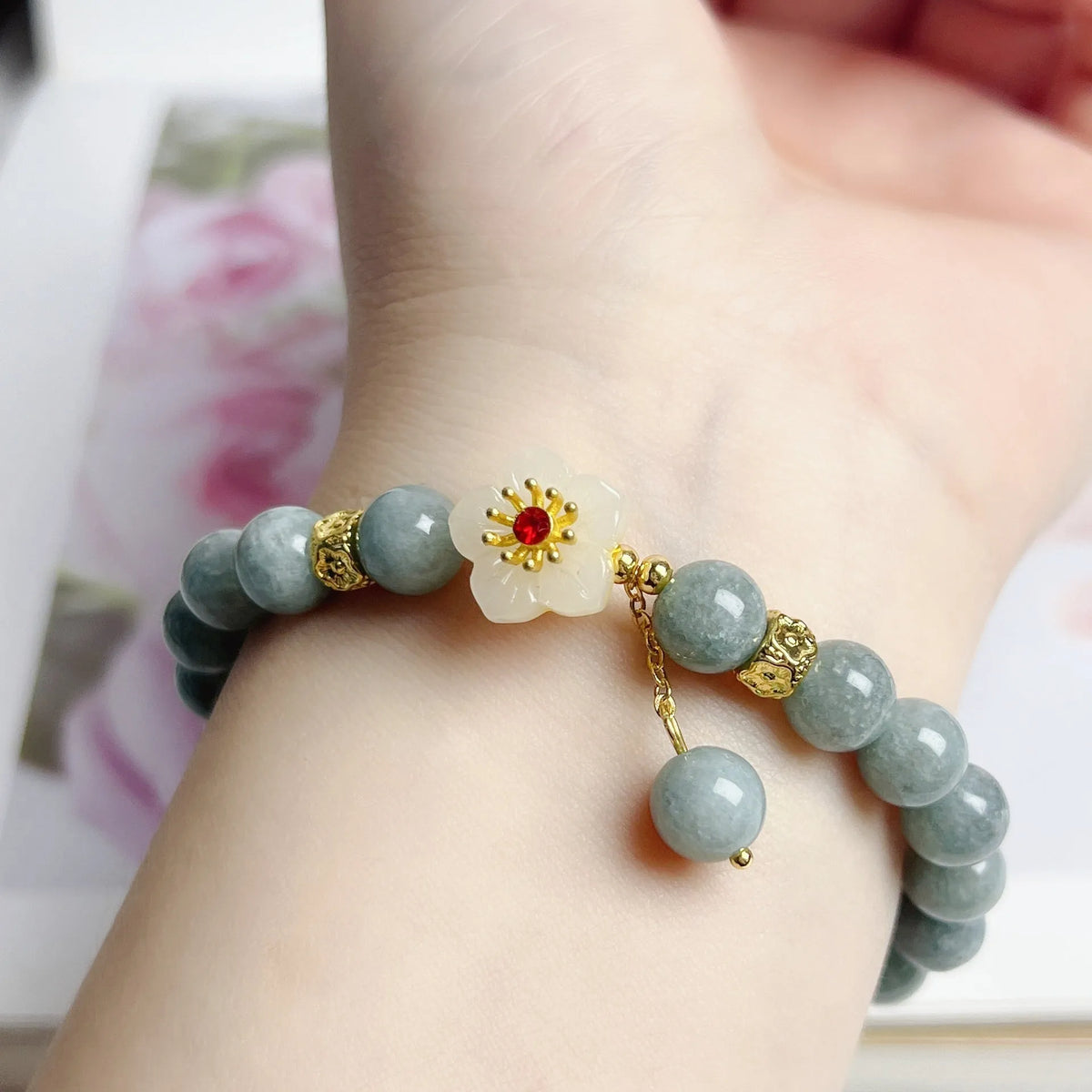 Women's adjustable jade bracelet with rope fastening showing retro styling and optimised jade colour