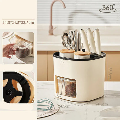 White rotating plastic kitchen storage bucket and a separate white spice box with four compartments on a countertop.