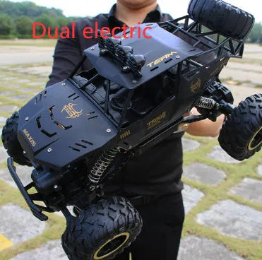 Four-wheel drive remote control car with 2.4G wireless controller on rough terrain