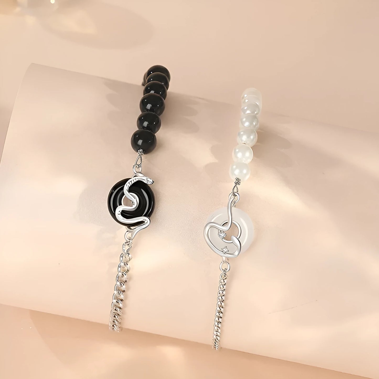 A New Chinese style 925 sterling silver couple's bracelet with snake zodiac detailing and a safe buckle clasp.