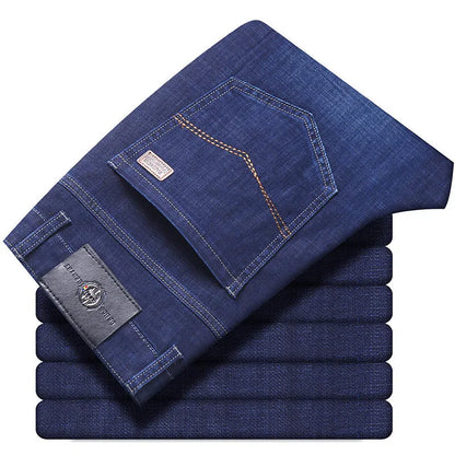 Men's straight-leg stretch jeans in black or blue denim with a zip fly, shown laid flat.