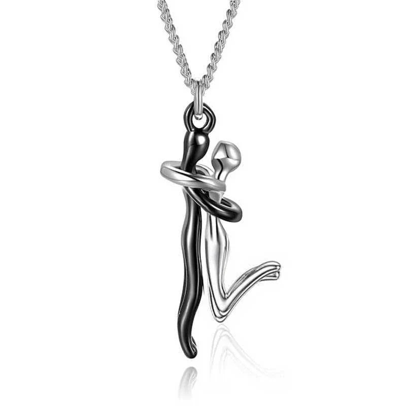 Elegant 18K plated love hug necklace with charming embrace-shaped pendant and delicate cross-chain design