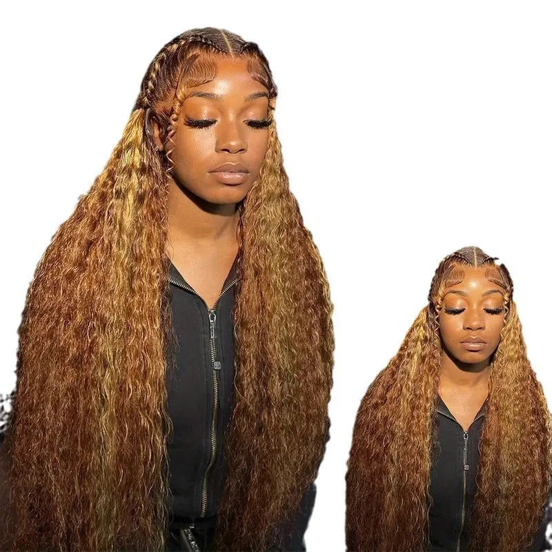 A long curly synthetic lace wig in a highlight gradient colour, shown on a wig stand.