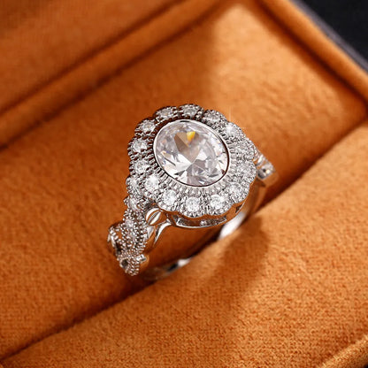 Round zircon ring with geometric design in F1770 white gold colour plating, available sizes 6 to 10