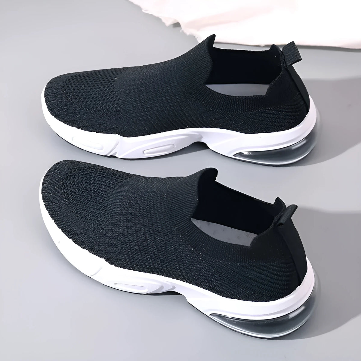 Slip-on breathable mesh sock shoes with a low-top design and PVC sole, shown in a neutral colour.