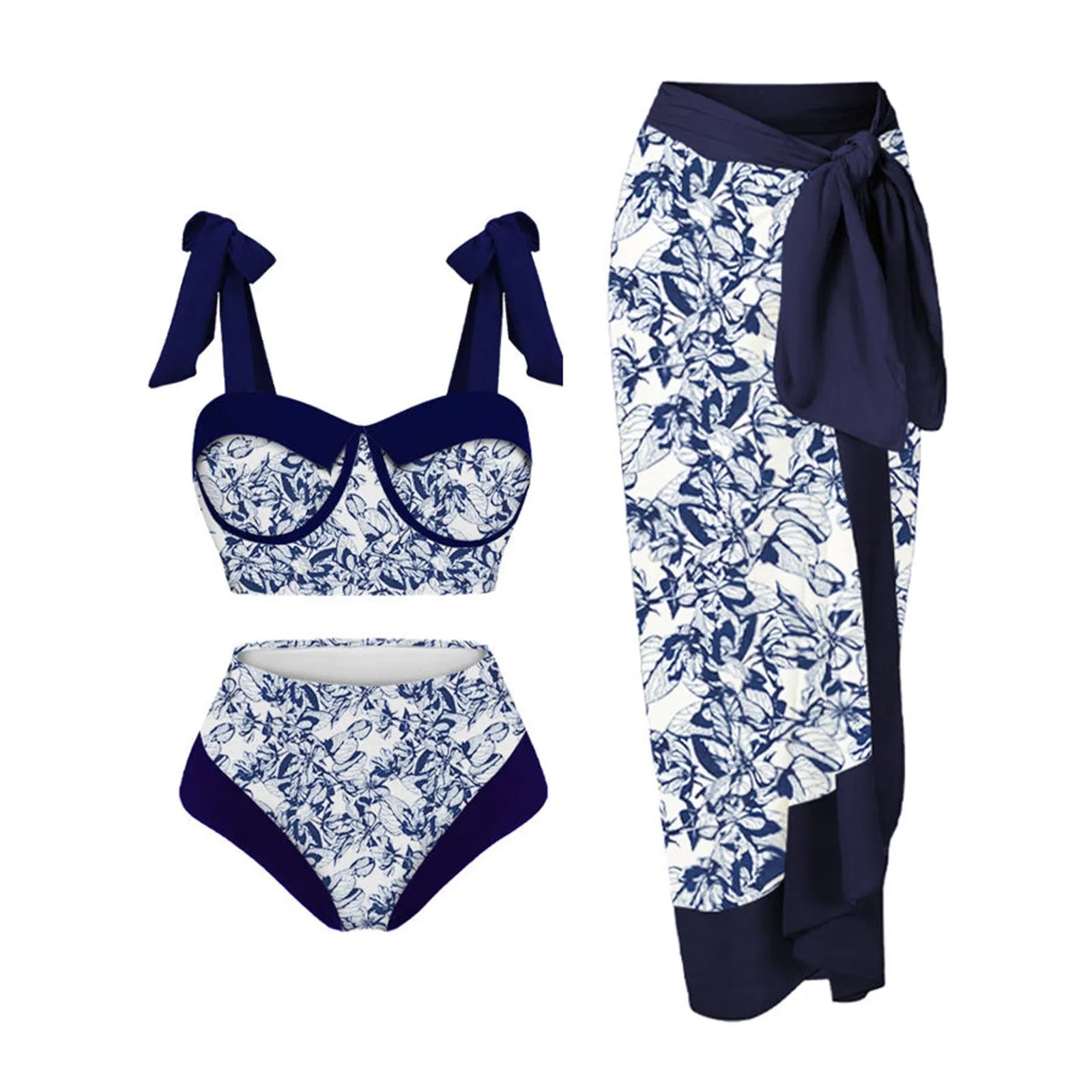 Women's pink and floral print split swimsuit three-piece set with skirt, bra, and panties.