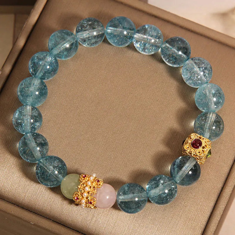 Blue and colourful cube sugar crystal bracelet with flexible ring in a Chinese style for women.