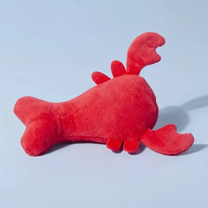 Red crab lobster shaped squeaky stuffed dog toy for small and medium breeds on a white background.