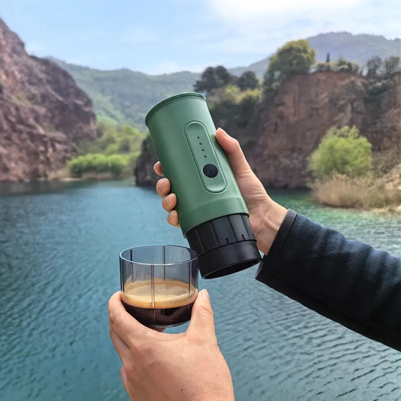 Portable stainless steel coffee machine with car charger power cord in Jungle Green colour.