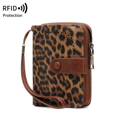 Small leopard print wallet with zipper closure showing stitching details