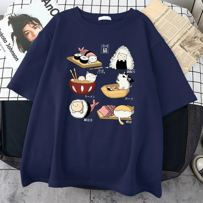 Man wearing a black loose-fit cotton t-shirt with a colourful cute cat sushi cartoon print on the front.