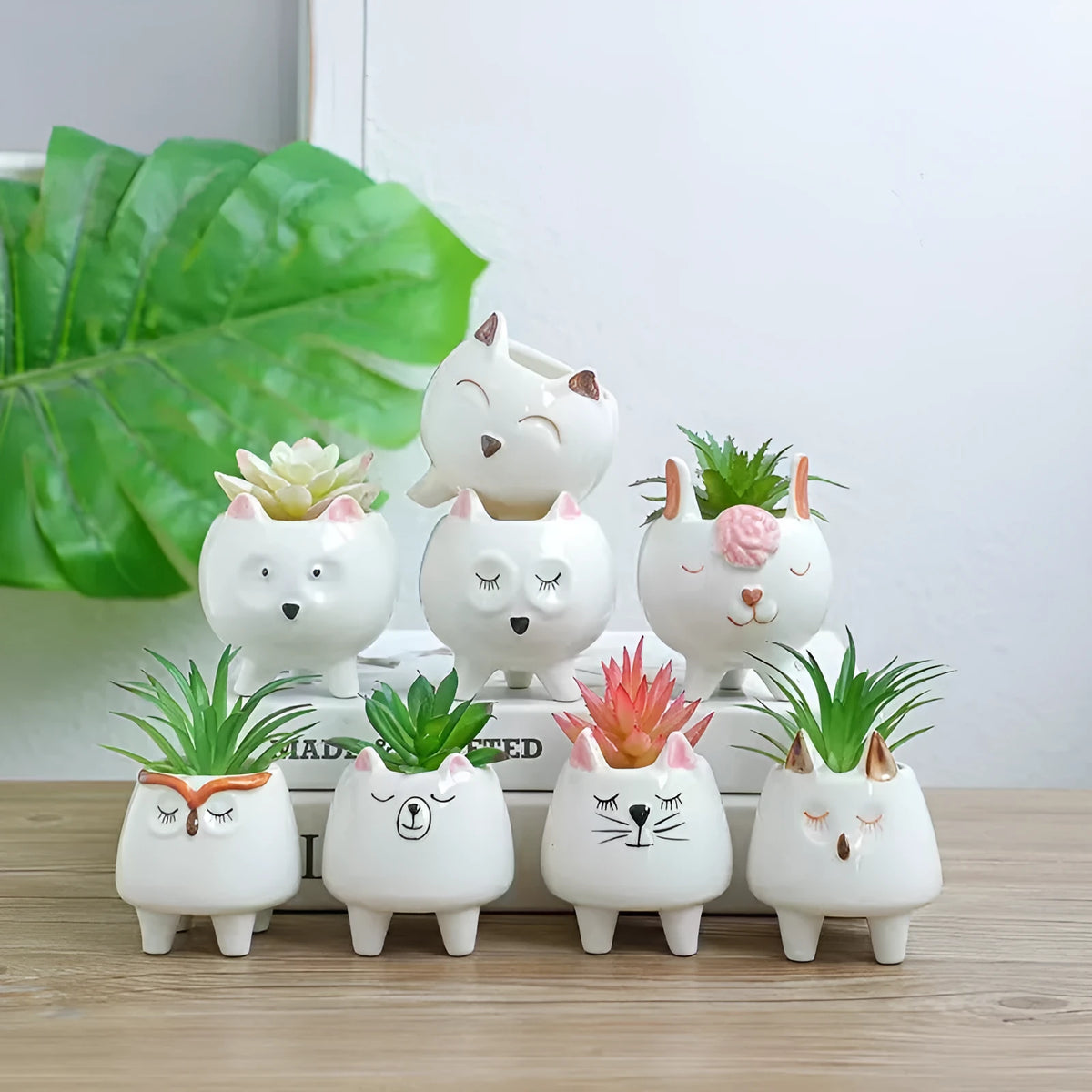 Ceramic succulent flowerpot with hand-painted cartoon animal and floral design in rustic style