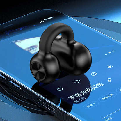 Black wireless Bluetooth clip-on earphones with bone conduction technology on a white background.