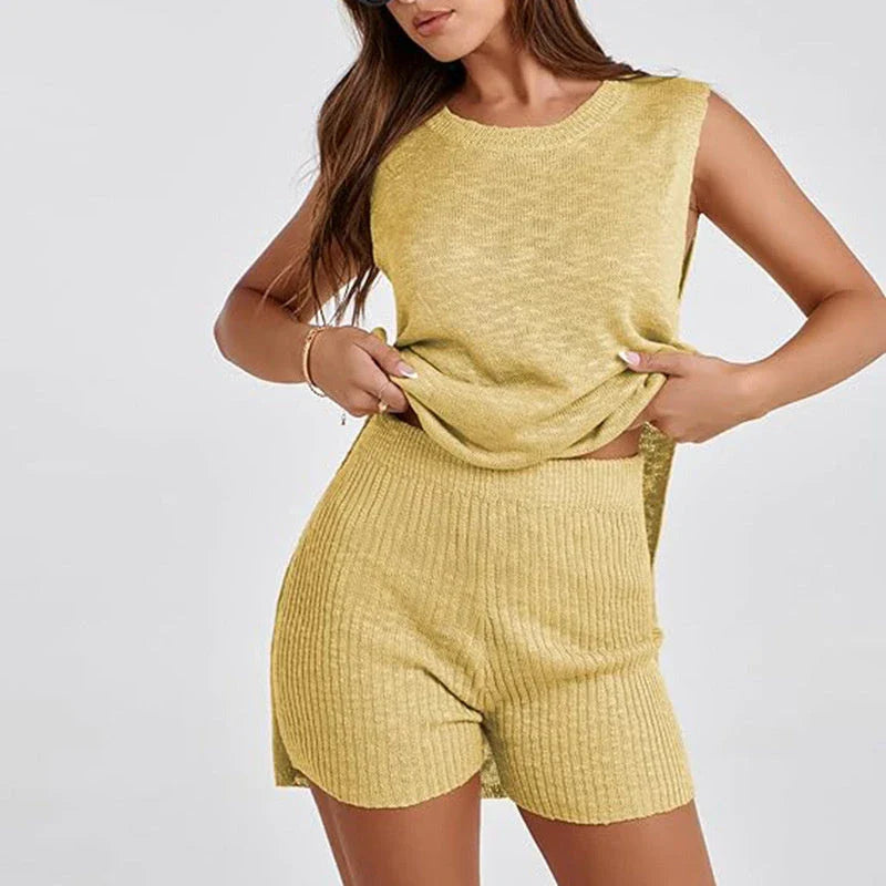 Stylish two-piece knit jumpsuit in a variety of vibrant colors, featuring a split-front top and comfortable shorts