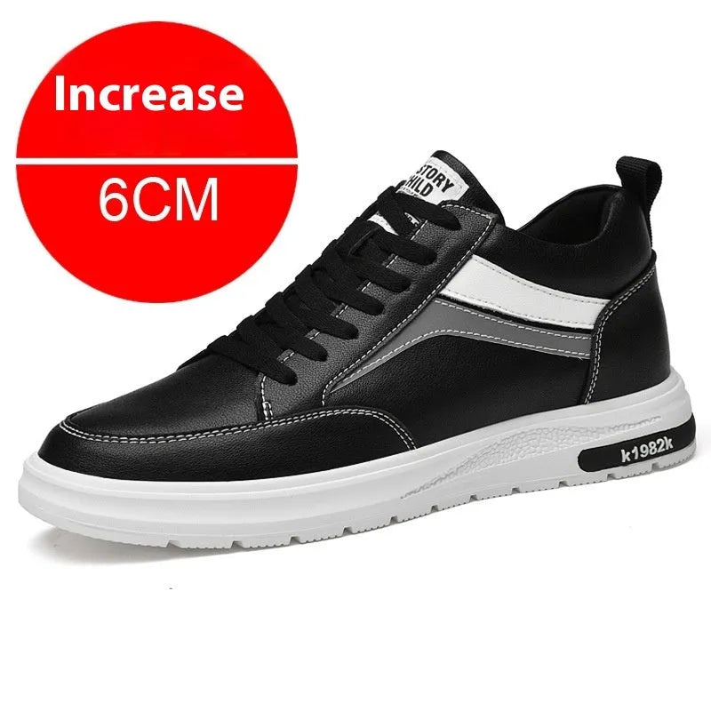 Men's white and black low-top casual sneakers with round toe and lace-up front, showcasing sewing line detail.